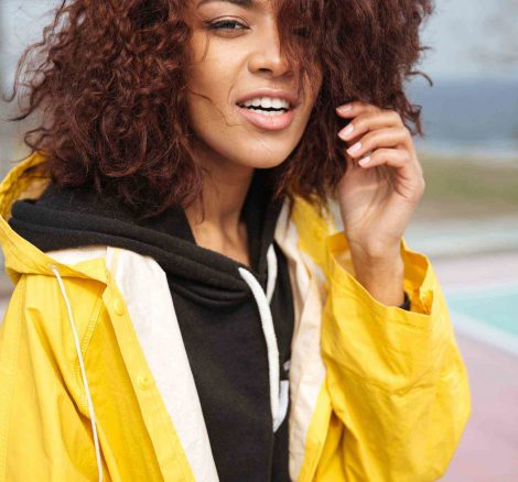 amazing-african-curly-young-woman-wearing-yellow-PCUMRSX-unsplash-scaled.jpg